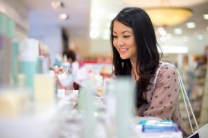 Cetyl ethylhexanoate is used in beauty and personal care that the women is looking at